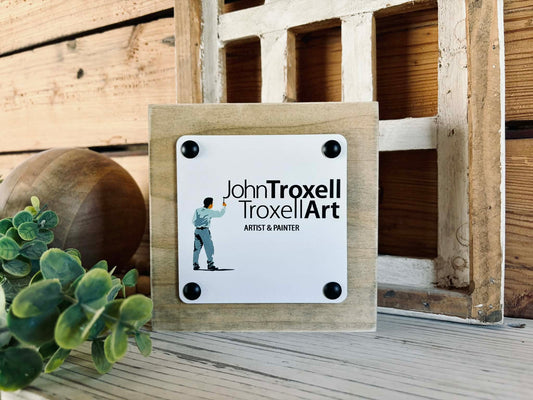 Custom 6x6 business logo mini block with a white UV-printed logo on a maple wood top and a Driftwood stained wood base.
