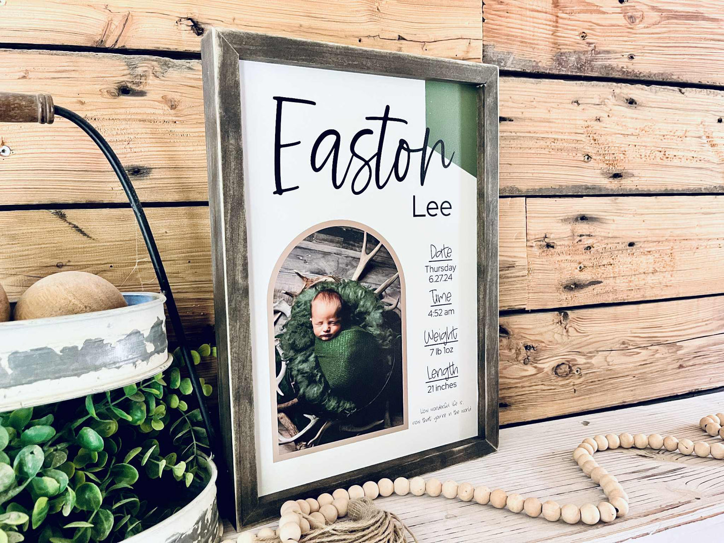 Framed 12x16 newborn photo printed on wood with birth statistics
