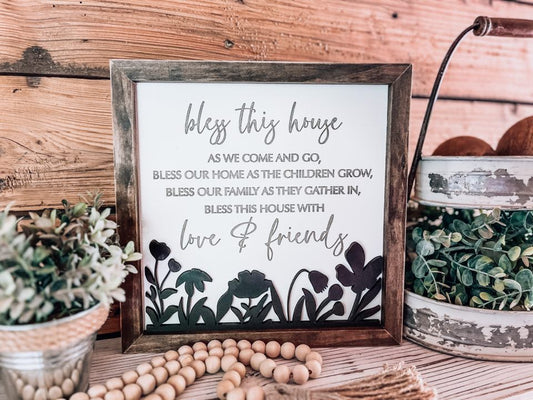 Handmade Bless This House wooden sign with 3D floral cutout and engraved farmhouse poem in a Jacobean wood frame.
