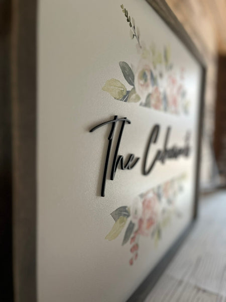 18x24 Custom Family Name Sign with 3D letters and watercolor florals in a Jacobean wood frame.