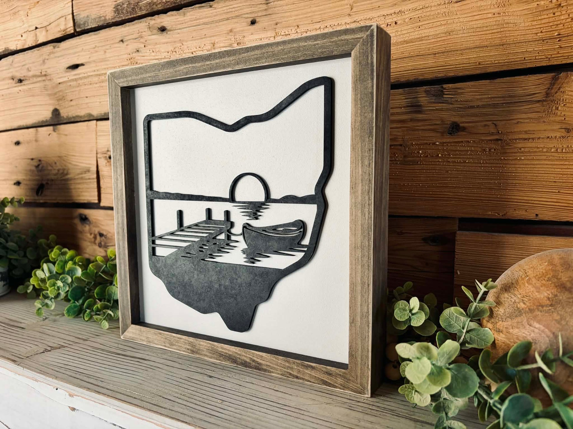 3D Ohio state outline wood sign with layered lake and forest landscape in a rustic brown frame.