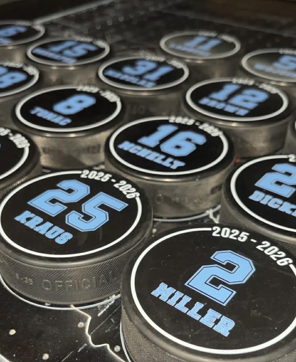 Official 6oz regulation rubber hockey puck with custom full-color logo printing.