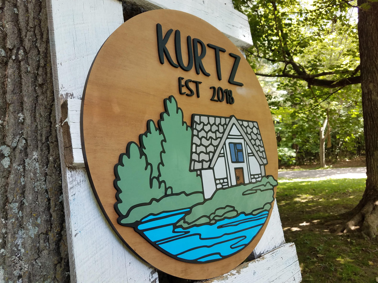 Round Personalized Name and Established Date Sign with Raised Lettering and Cabin Scene